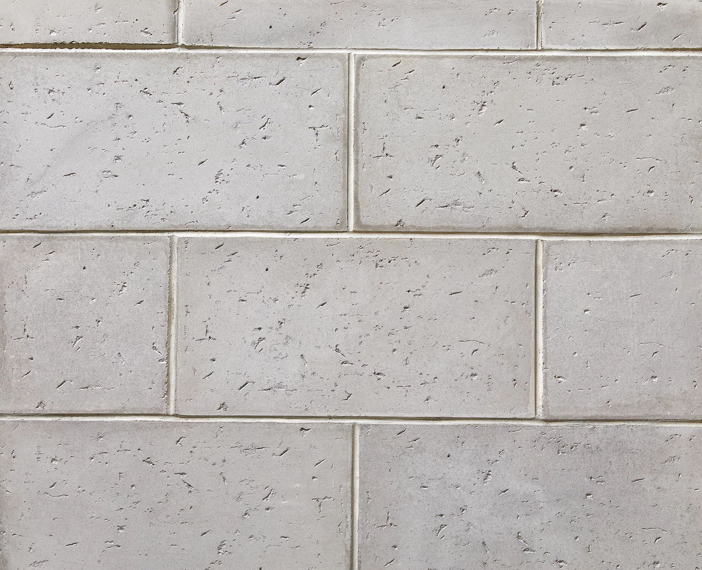 Folheado de pedra Tivoli em metal de arma